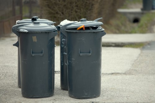 Hazardous waste containers ready for disposal in Feltham